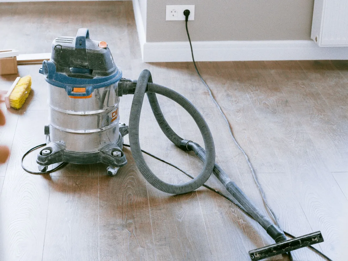 A vacuum cleaner in a freshly renovated room